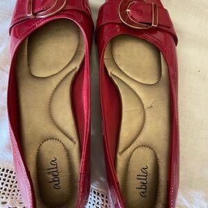 Red patent leather flats